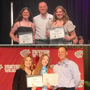 Loyd Bourgeois presents scholarship awards to recipients